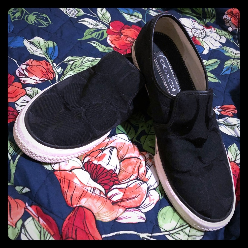 Black signature COACH Sanders slip ons